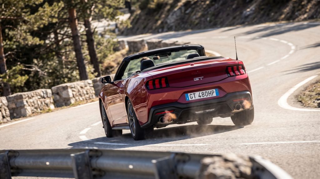 Mustang convertible taking corner